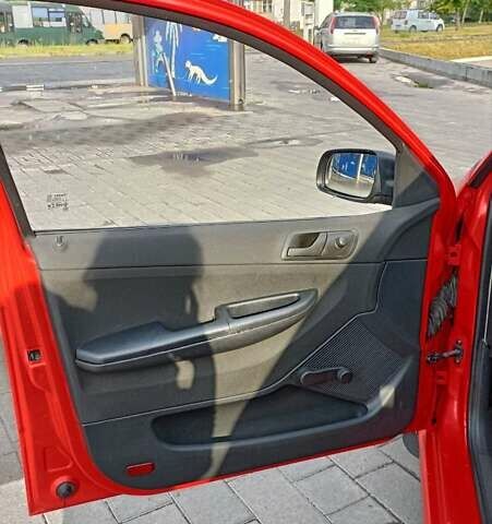 Красный Шкода Фабия, объемом двигателя 1.2 л и пробегом 184 тыс. км за 3000 $, фото 4 на Automoto.ua