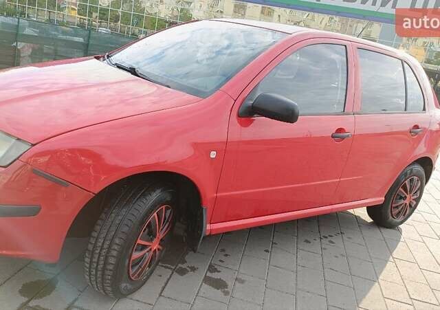 Красный Шкода Фабия, объемом двигателя 1.2 л и пробегом 184 тыс. км за 3000 $, фото 5 на Automoto.ua