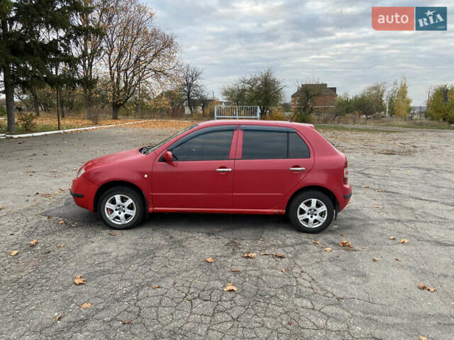 Червоний Шкода Фабія, об'ємом двигуна 1.39 л та пробігом 180 тис. км за 2350 $, фото 3 на Automoto.ua