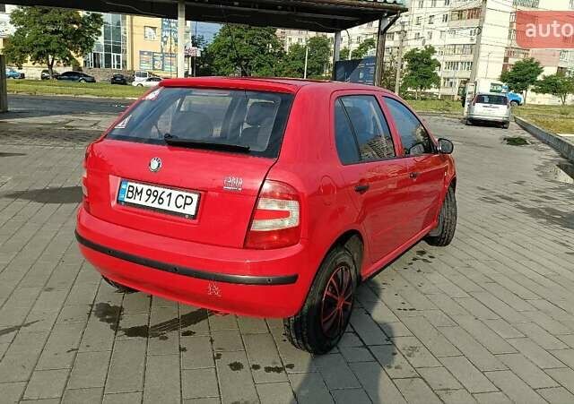 Красный Шкода Фабия, объемом двигателя 1.2 л и пробегом 184 тыс. км за 3000 $, фото 2 на Automoto.ua