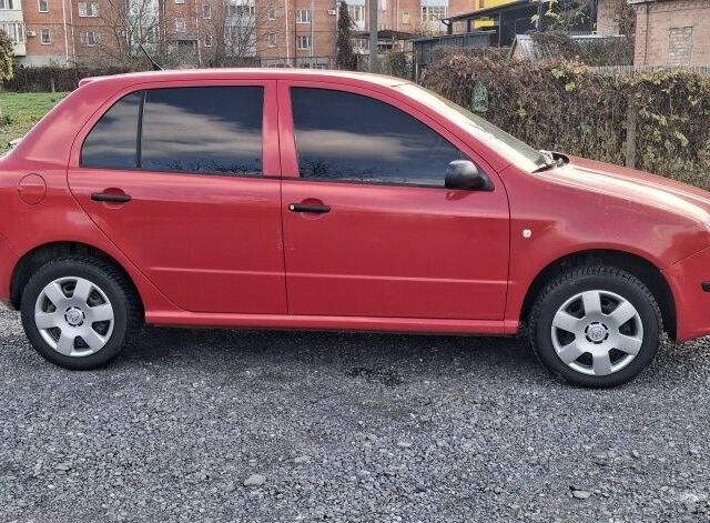 Красный Шкода Фабия, объемом двигателя 1.4 л и пробегом 365 тыс. км за 2999 $, фото 3 на Automoto.ua
