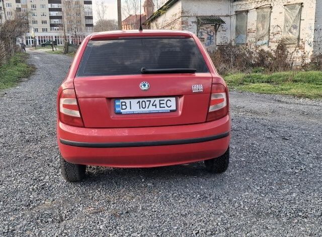 Красный Шкода Фабия, объемом двигателя 1.4 л и пробегом 365 тыс. км за 2999 $, фото 5 на Automoto.ua