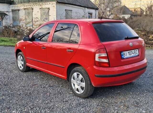 Красный Шкода Фабия, объемом двигателя 1.4 л и пробегом 365 тыс. км за 2999 $, фото 6 на Automoto.ua