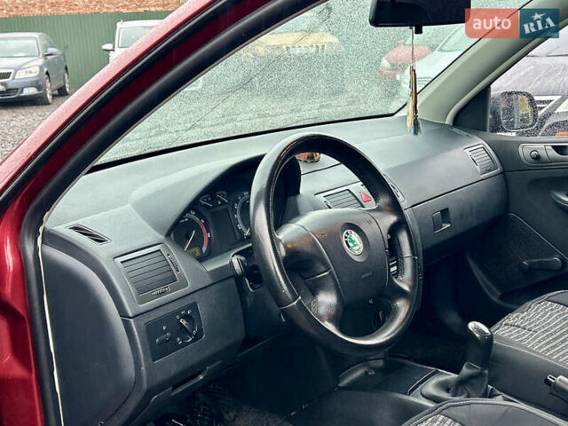 Красный Шкода Фабия, объемом двигателя 1.2 л и пробегом 189 тыс. км за 3599 $, фото 7 на Automoto.ua