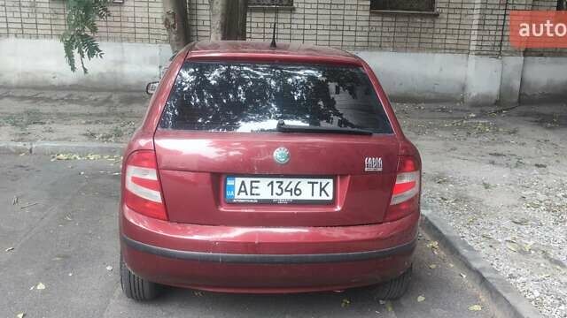 Шкода Фабия 2006 в Днепре (Днепропетровске) на Automoto.ua Красный Шкода Фабия, объемом двигателя 1.2 л и пробегом 255 тыс. км за 3500 $, фото 1 на Automoto.ua