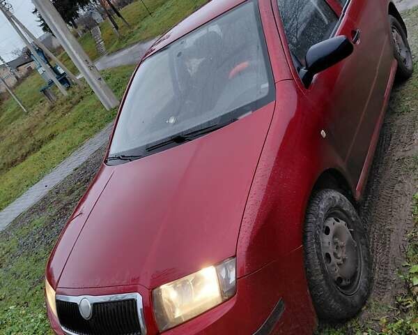 Красный Шкода Фабия, объемом двигателя 1.2 л и пробегом 156 тыс. км за 4050 $, фото 1 на Automoto.ua