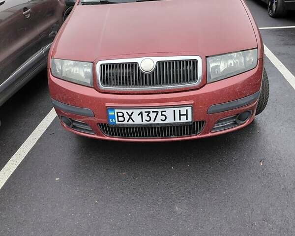 Красный Шкода Фабия, объемом двигателя 1.2 л и пробегом 156 тыс. км за 4050 $, фото 4 на Automoto.ua