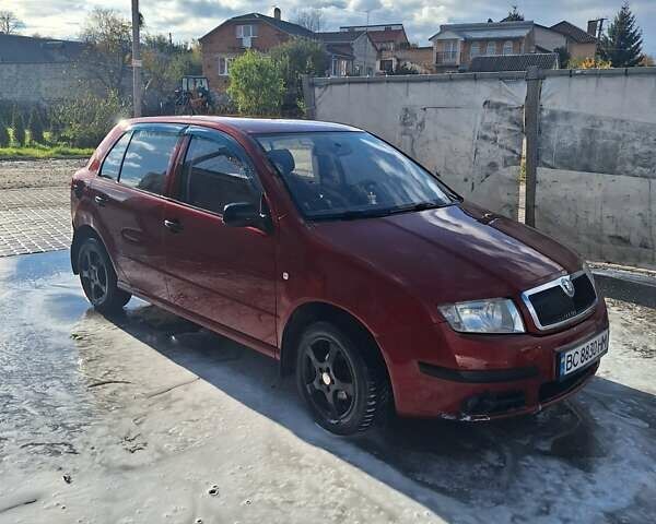 Красный Шкода Фабия, объемом двигателя 1.2 л и пробегом 260 тыс. км за 2700 $, фото 4 на Automoto.ua