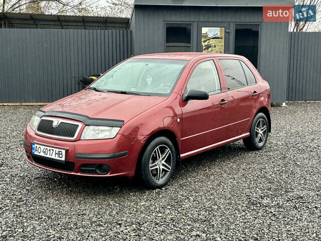 Красный Шкода Фабия, объемом двигателя 1.2 л и пробегом 189 тыс. км за 3599 $, фото 1 на Automoto.ua