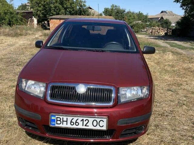 Красный Шкода Фабия, объемом двигателя 1.2 л и пробегом 260 тыс. км за 2950 $, фото 4 на Automoto.ua