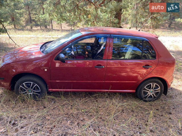 Красный Шкода Фабия, объемом двигателя 1.2 л и пробегом 233 тыс. км за 2950 $, фото 6 на Automoto.ua
