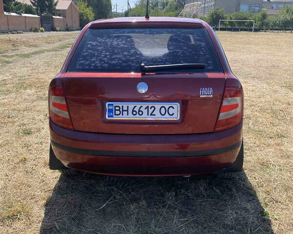 Красный Шкода Фабия, объемом двигателя 1.2 л и пробегом 260 тыс. км за 2950 $, фото 7 на Automoto.ua