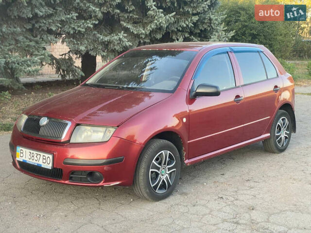 Красный Шкода Фабия, объемом двигателя 1.2 л и пробегом 233 тыс. км за 2950 $, фото 3 на Automoto.ua