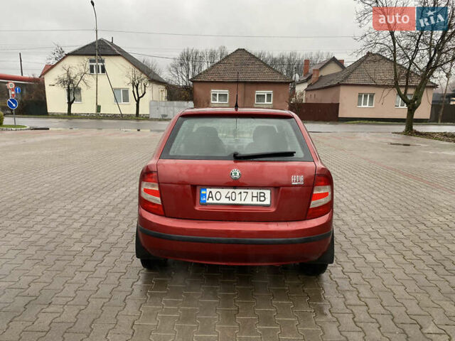 Красный Шкода Фабия, объемом двигателя 1.2 л и пробегом 189 тыс. км за 2999 $, фото 4 на Automoto.ua
