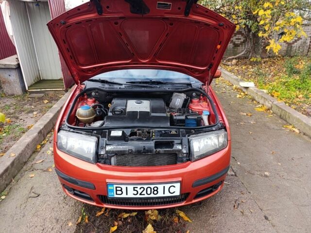 Червоний Шкода Фабія, об'ємом двигуна 1.2 л та пробігом 188 тис. км за 3800 $, фото 4 на Automoto.ua