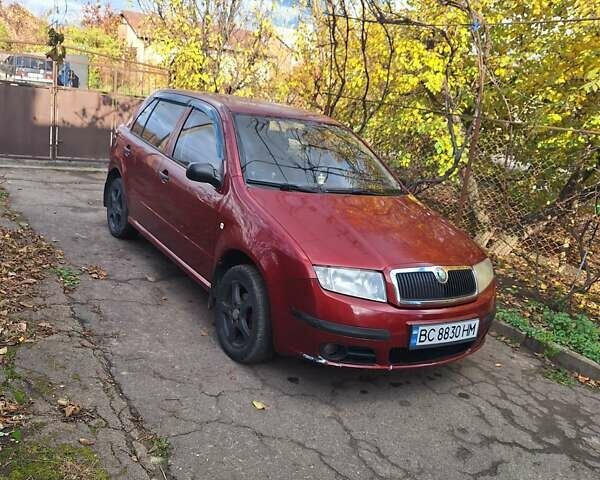 Красный Шкода Фабия, объемом двигателя 1.2 л и пробегом 260 тыс. км за 2700 $, фото 6 на Automoto.ua