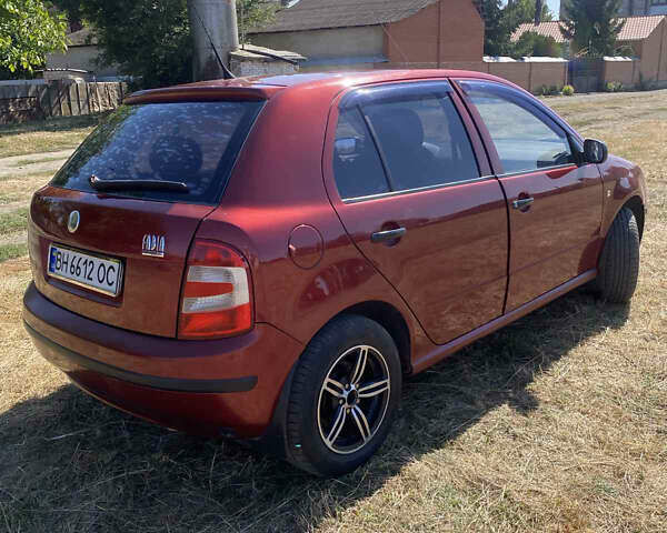 Красный Шкода Фабия, объемом двигателя 1.2 л и пробегом 260 тыс. км за 2950 $, фото 2 на Automoto.ua