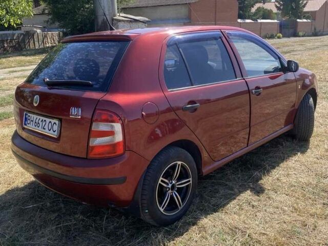 Красный Шкода Фабия, объемом двигателя 1.2 л и пробегом 260 тыс. км за 2950 $, фото 3 на Automoto.ua
