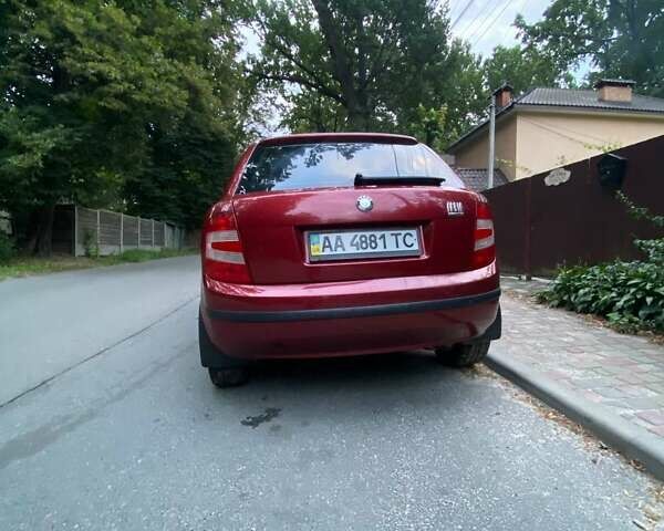 Красный Шкода Фабия, объемом двигателя 1.2 л и пробегом 166 тыс. км за 3700 $, фото 3 на Automoto.ua