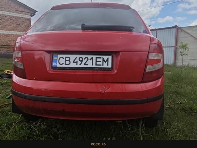 Красный Шкода Фабия, объемом двигателя 1.2 л и пробегом 173 тыс. км за 3000 $, фото 2 на Automoto.ua