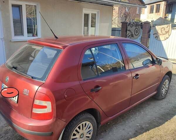 Красный Шкода Фабия, объемом двигателя 1.2 л и пробегом 200 тыс. км за 3300 $, фото 3 на Automoto.ua