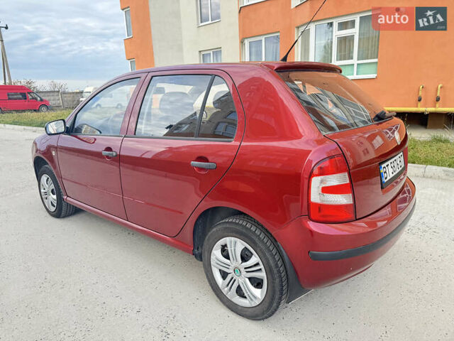Красный Шкода Фабия, объемом двигателя 1.2 л и пробегом 155 тыс. км за 3499 $, фото 3 на Automoto.ua