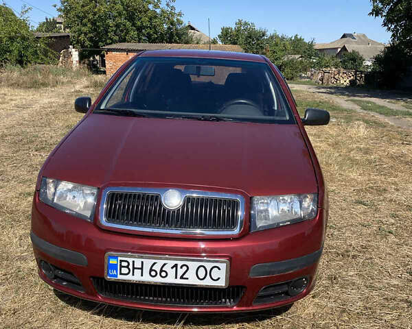 Красный Шкода Фабия, объемом двигателя 1.2 л и пробегом 260 тыс. км за 2950 $, фото 6 на Automoto.ua