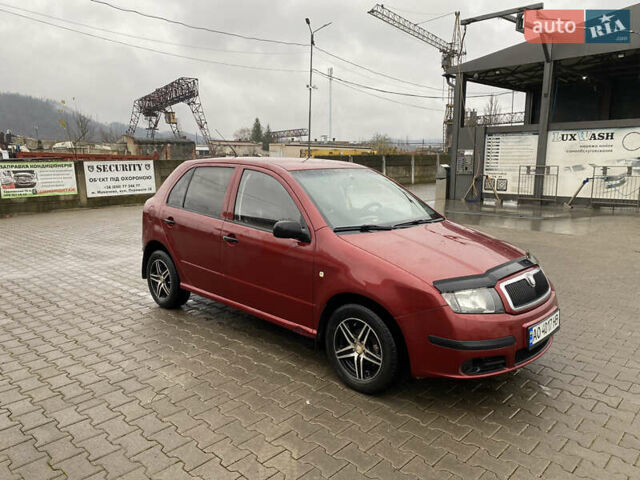 Красный Шкода Фабия, объемом двигателя 1.2 л и пробегом 189 тыс. км за 2999 $, фото 2 на Automoto.ua