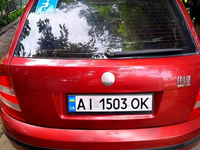 Красный Шкода Фабия, объемом двигателя 1.2 л и пробегом 263 тыс. км за 2900 $, фото 4 на Automoto.ua