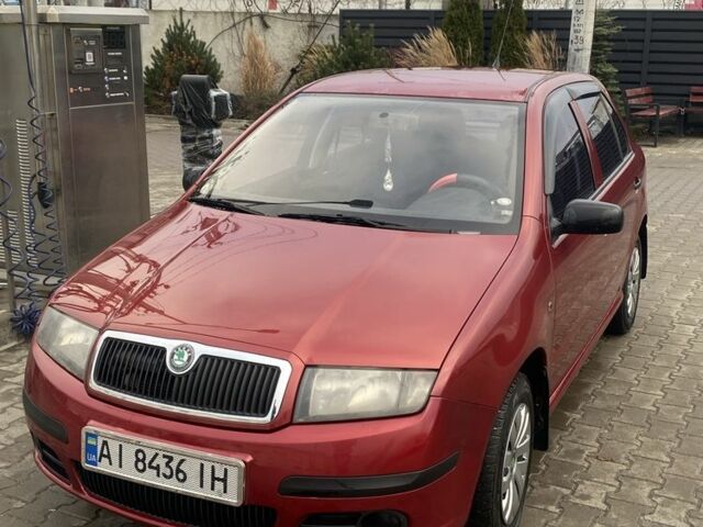 Красный Шкода Фабия, объемом двигателя 1.2 л и пробегом 221 тыс. км за 3950 $, фото 1 на Automoto.ua