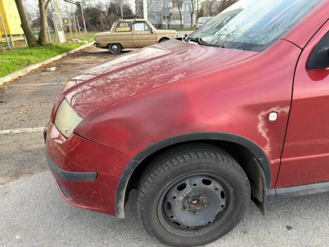 Красный Шкода Фабия, объемом двигателя 1.2 л и пробегом 283 тыс. км за 3700 $, фото 5 на Automoto.ua