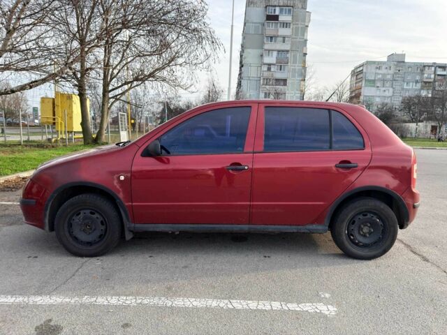 Красный Шкода Фабия, объемом двигателя 1.2 л и пробегом 283 тыс. км за 3700 $, фото 2 на Automoto.ua