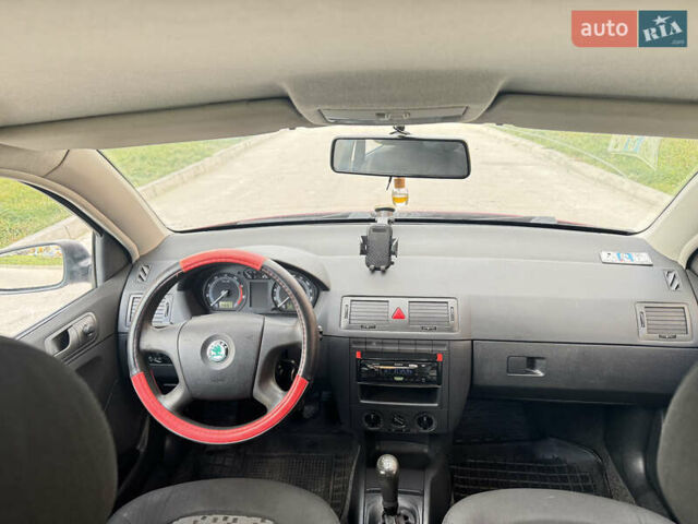 Красный Шкода Фабия, объемом двигателя 1.2 л и пробегом 155 тыс. км за 3499 $, фото 10 на Automoto.ua