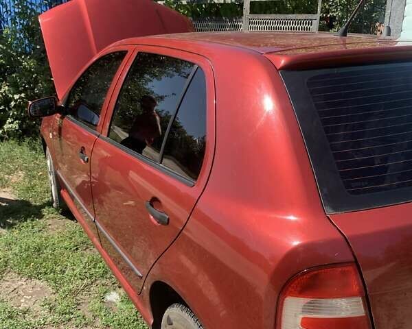 Красный Шкода Фабия, объемом двигателя 1.2 л и пробегом 124 тыс. км за 4200 $, фото 6 на Automoto.ua