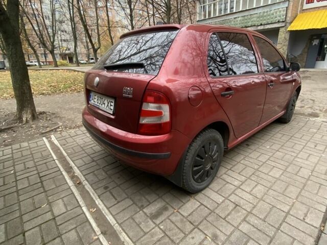 Красный Шкода Фабия, объемом двигателя 1.2 л и пробегом 213 тыс. км за 3500 $, фото 1 на Automoto.ua