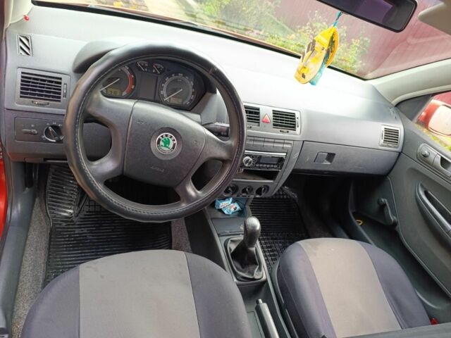 Червоний Шкода Фабія, об'ємом двигуна 1.2 л та пробігом 188 тис. км за 3800 $, фото 5 на Automoto.ua