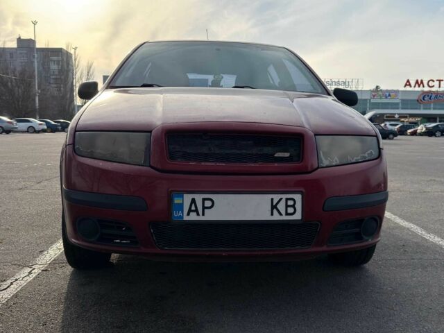 Красный Шкода Фабия, объемом двигателя 1.2 л и пробегом 283 тыс. км за 3700 $, фото 1 на Automoto.ua