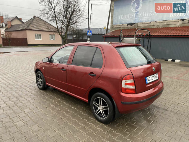 Красный Шкода Фабия, объемом двигателя 1.2 л и пробегом 189 тыс. км за 2999 $, фото 5 на Automoto.ua