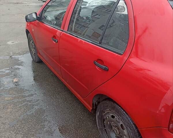 Красный Шкода Фабия, объемом двигателя 1.2 л и пробегом 409 тыс. км за 1800 $, фото 3 на Automoto.ua