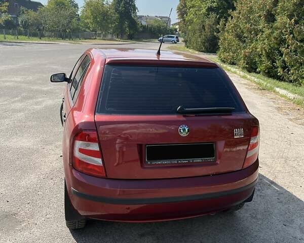 Красный Шкода Фабия, объемом двигателя 1.2 л и пробегом 253 тыс. км за 3750 $, фото 23 на Automoto.ua