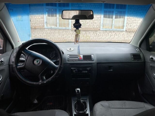 Красный Шкода Фабия, объемом двигателя 1.2 л и пробегом 250 тыс. км за 1650 $, фото 17 на Automoto.ua