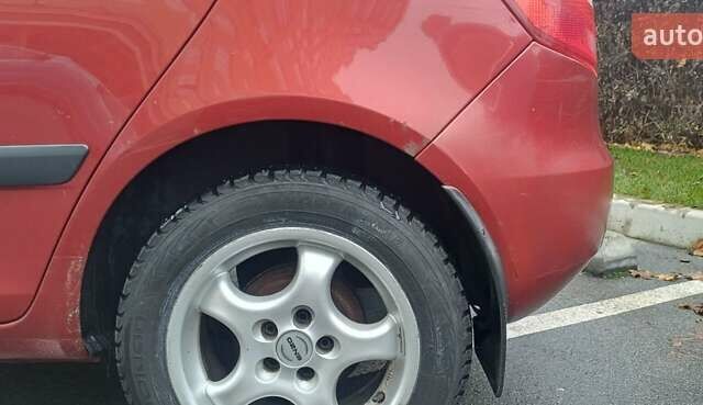 Красный Шкода Фабия, объемом двигателя 1.39 л и пробегом 280 тыс. км за 3900 $, фото 14 на Automoto.ua