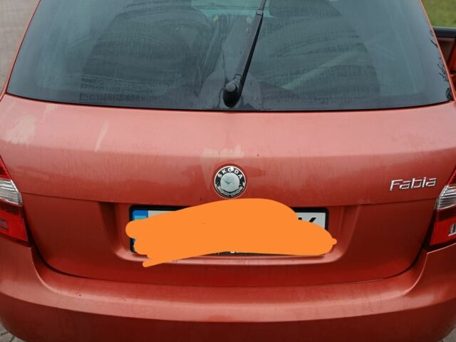 Красный Шкода Фабия, объемом двигателя 1.4 л и пробегом 207 тыс. км за 4500 $, фото 1 на Automoto.ua