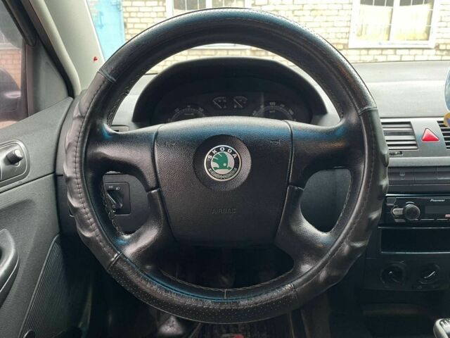 Красный Шкода Фабия, объемом двигателя 1.2 л и пробегом 250 тыс. км за 1650 $, фото 16 на Automoto.ua