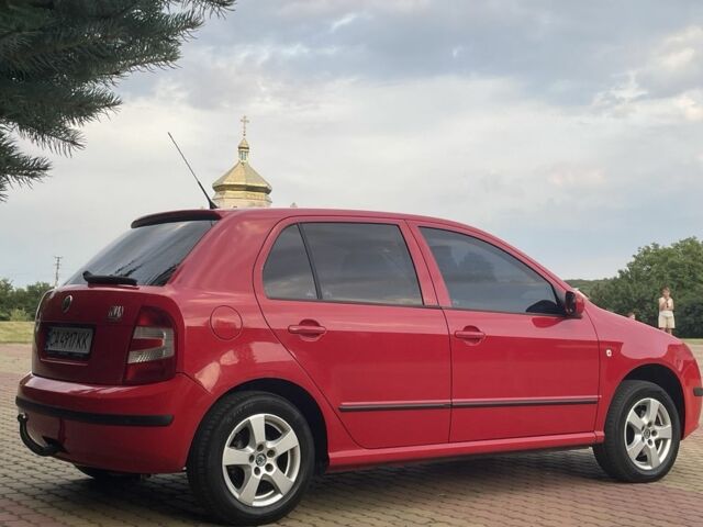 Красный Шкода Фабия, объемом двигателя 1.4 л и пробегом 250 тыс. км за 5200 $, фото 3 на Automoto.ua