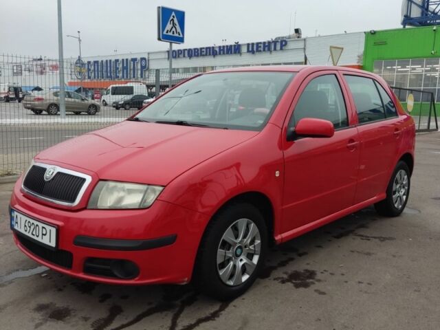 Красный Шкода Фабия, объемом двигателя 1.2 л и пробегом 240 тыс. км за 4200 $, фото 3 на Automoto.ua