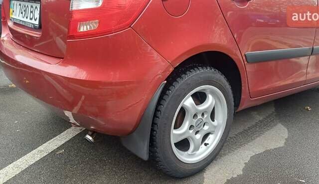 Красный Шкода Фабия, объемом двигателя 1.39 л и пробегом 280 тыс. км за 3900 $, фото 10 на Automoto.ua