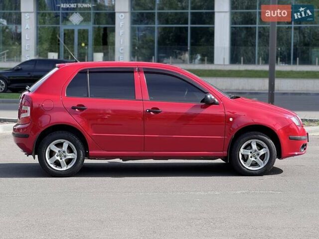 Красный Шкода Фабия, объемом двигателя 1.2 л и пробегом 175 тыс. км за 3300 $, фото 7 на Automoto.ua