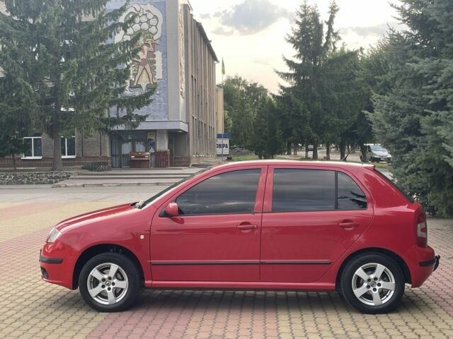 Красный Шкода Фабия, объемом двигателя 1.4 л и пробегом 250 тыс. км за 5200 $, фото 6 на Automoto.ua