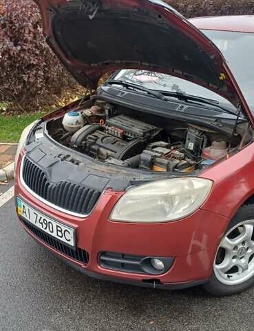 Красный Шкода Фабия, объемом двигателя 1.39 л и пробегом 280 тыс. км за 3900 $, фото 27 на Automoto.ua